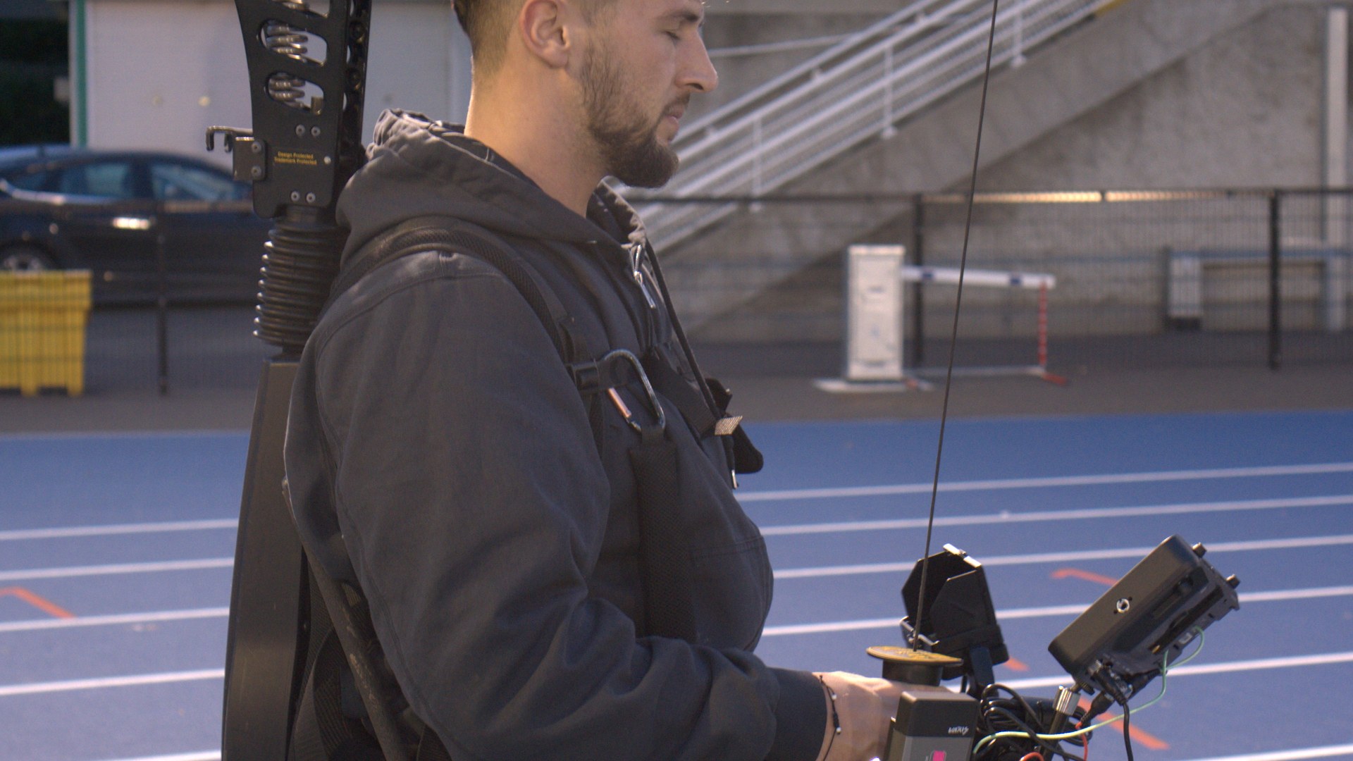 Shooting on the rig at the track, stands empty behind.