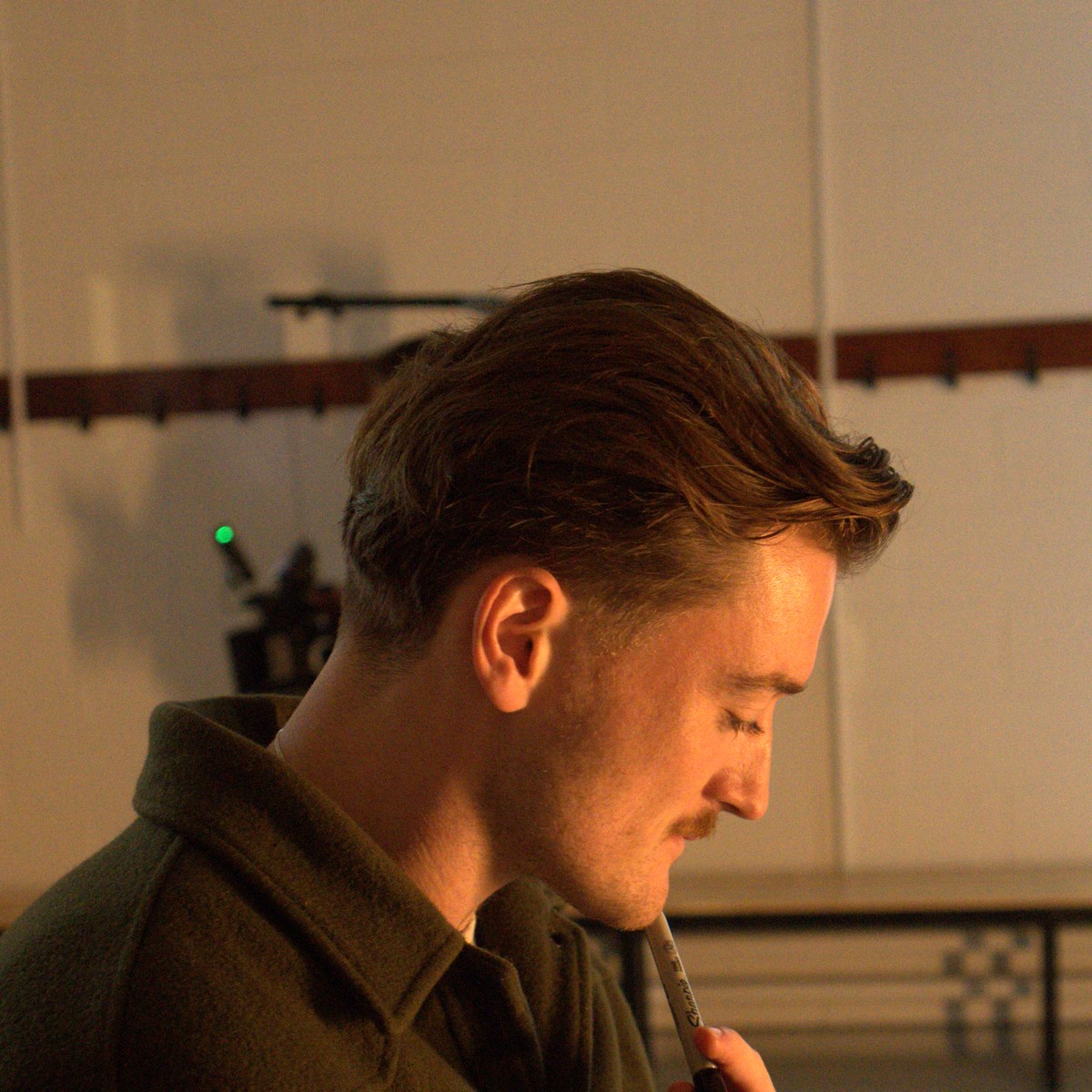 Oisín in profile, working out the next setup.